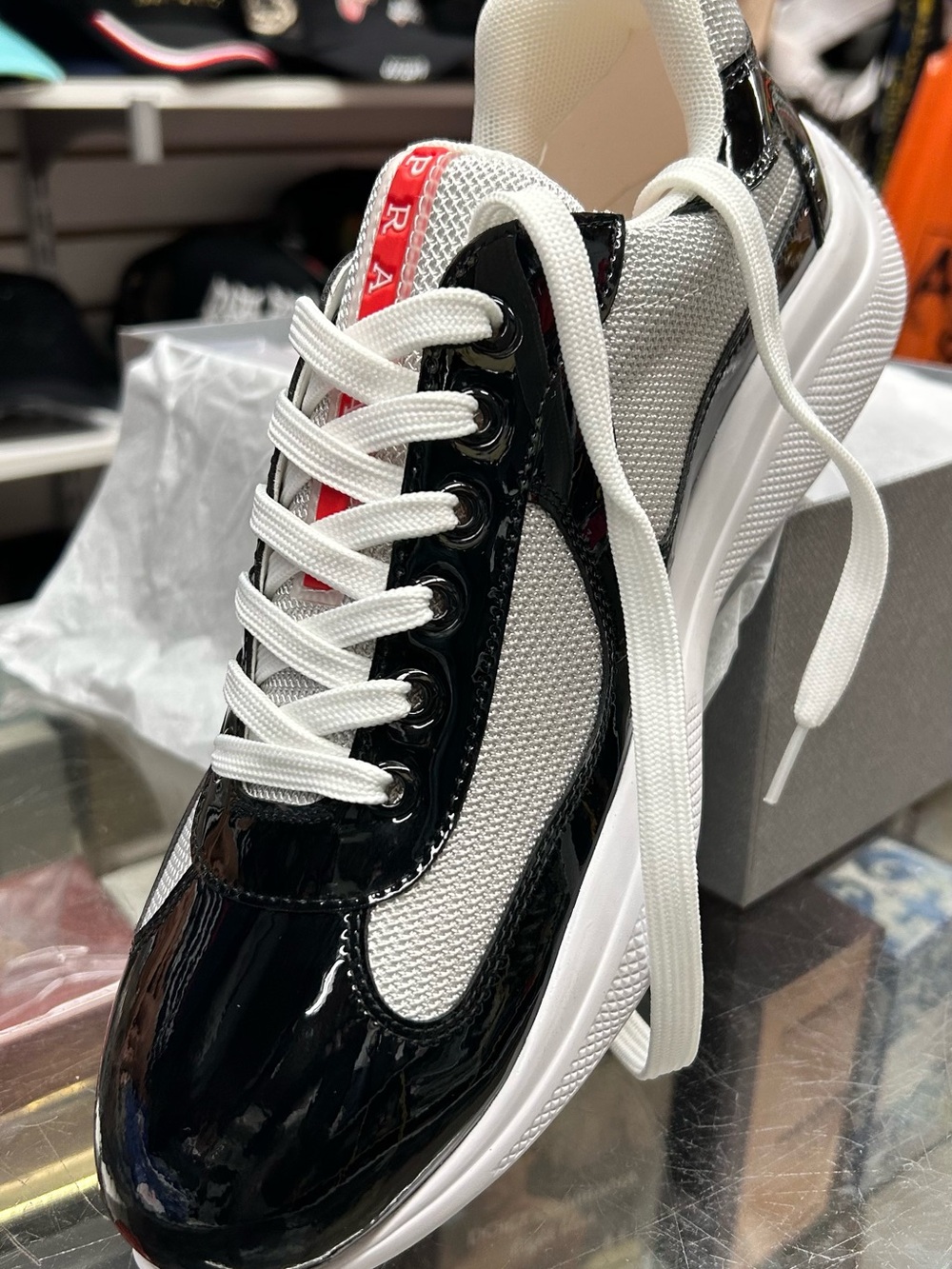 Prada Black Patent & White Mesh Women's Sneaker with Red Logo Accent